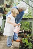 girlgrandmawateringplants.jpg
